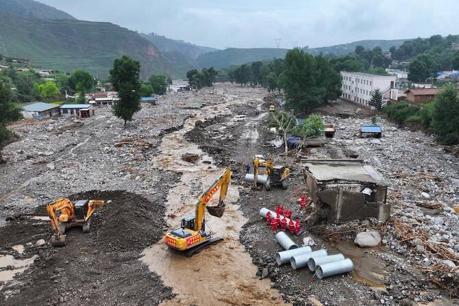 Heavy Rains Kill 13 in Northern China
